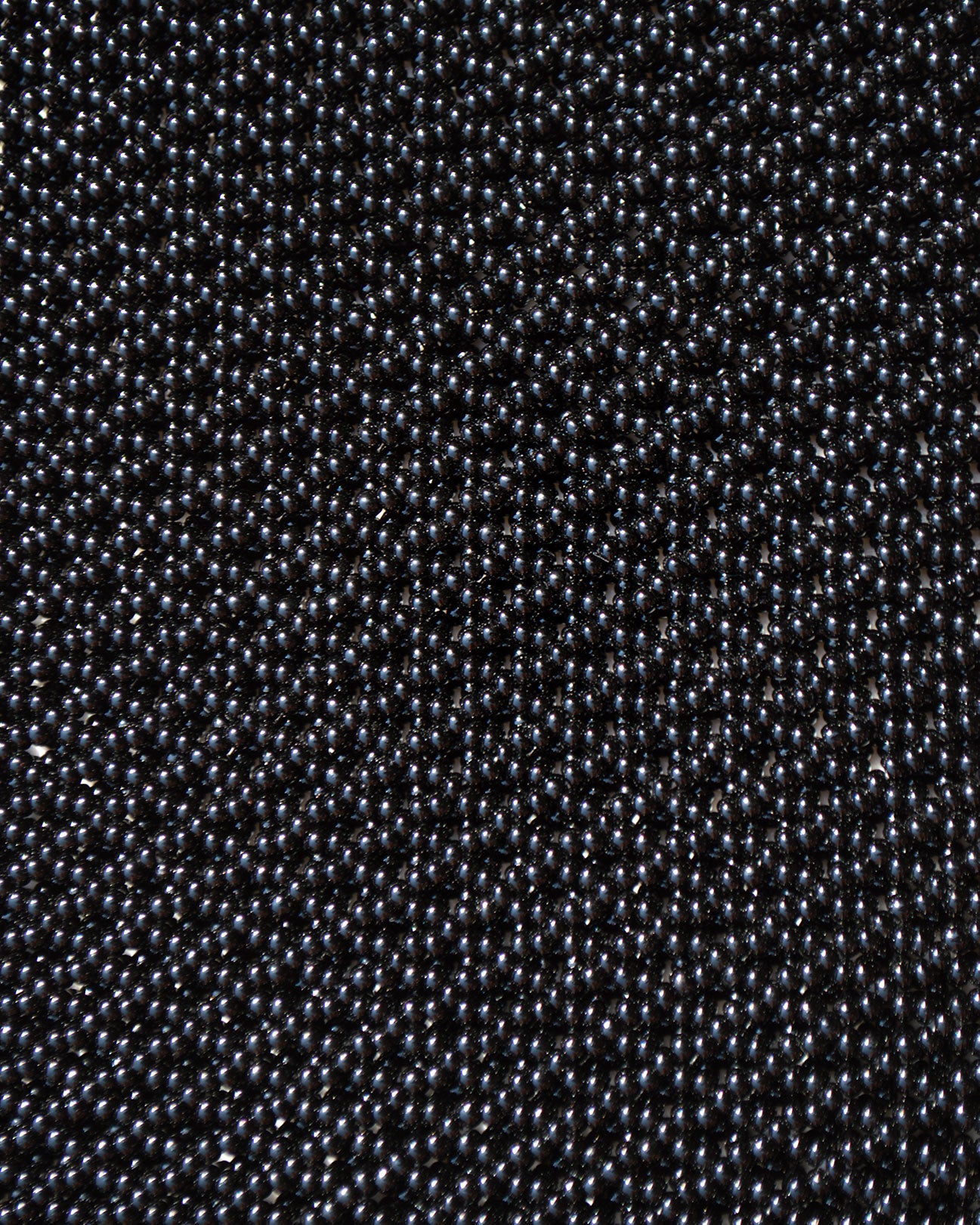 closeup picture of black beads as they are in all Marmaclub Fringe black bags