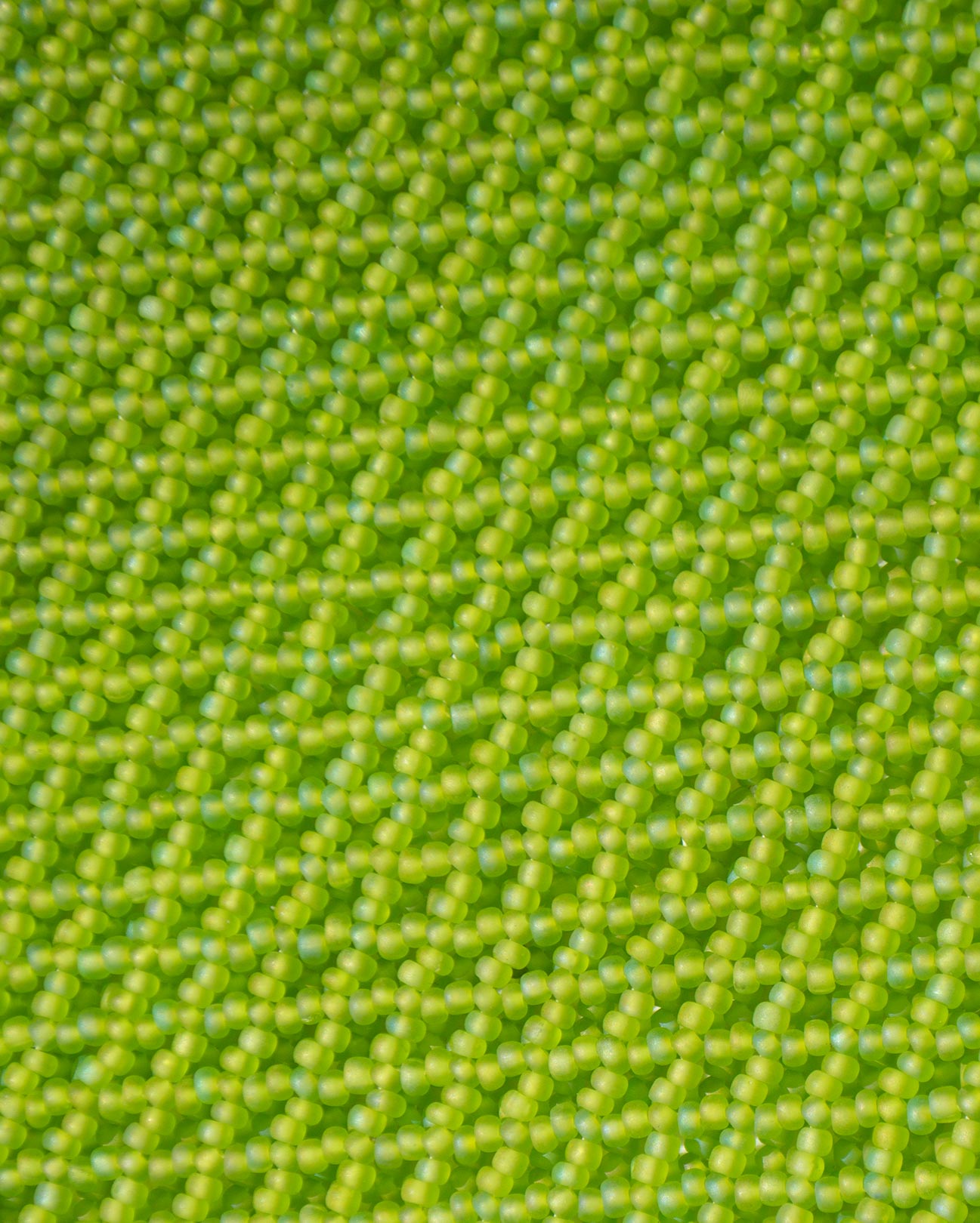 closeup picture of lime green beads in a pattern  as they are in all Marmaclub Fringe Lime Greenbags